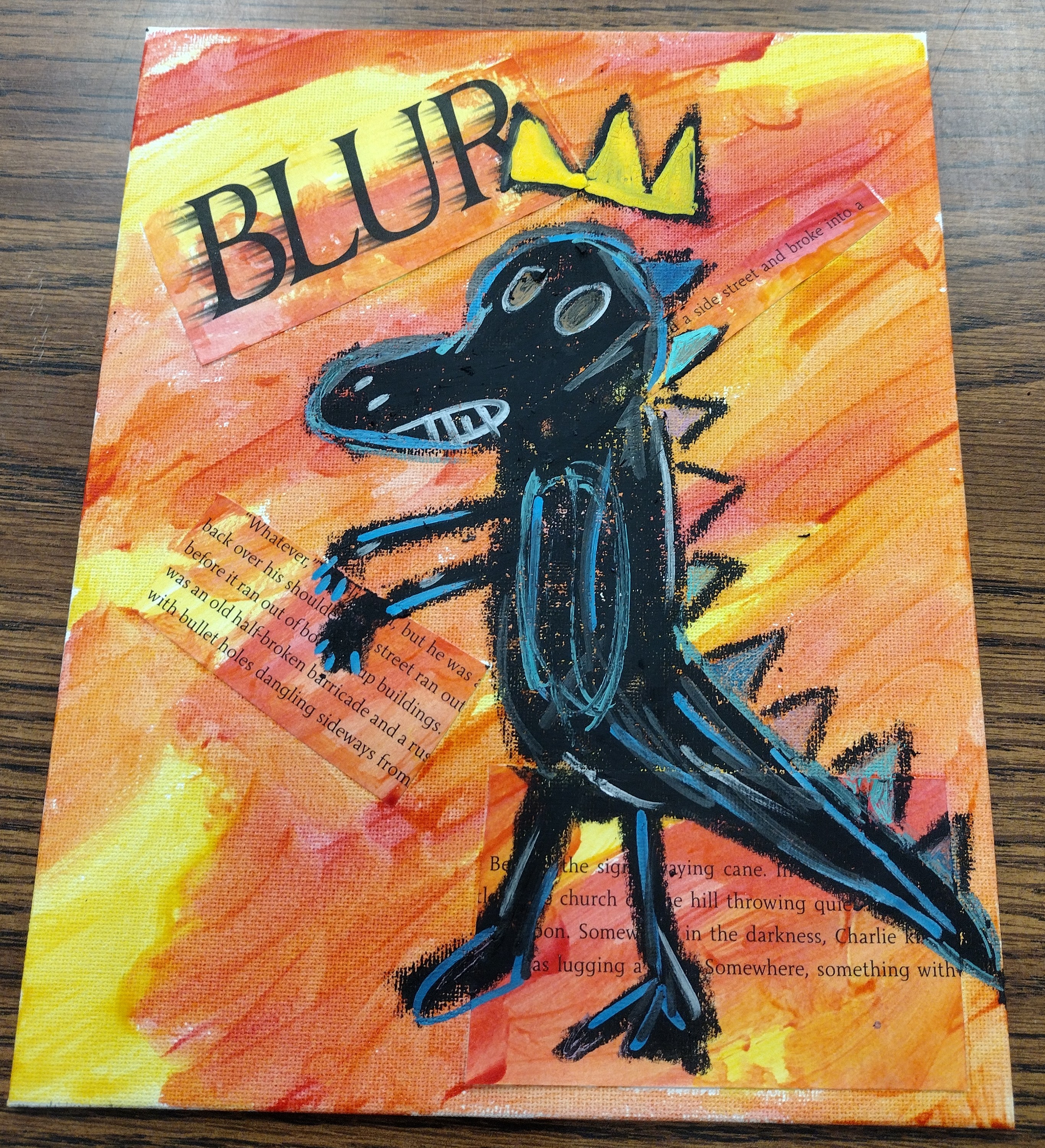 Mixed media dinosaur created with black pastels over a red, yellow, and orange, water colored painted canvas.