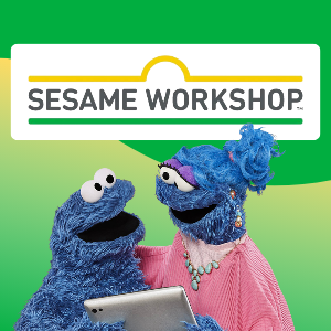 Picture of cookie monster and his mom looking a tablet, sesame workshop logo in background